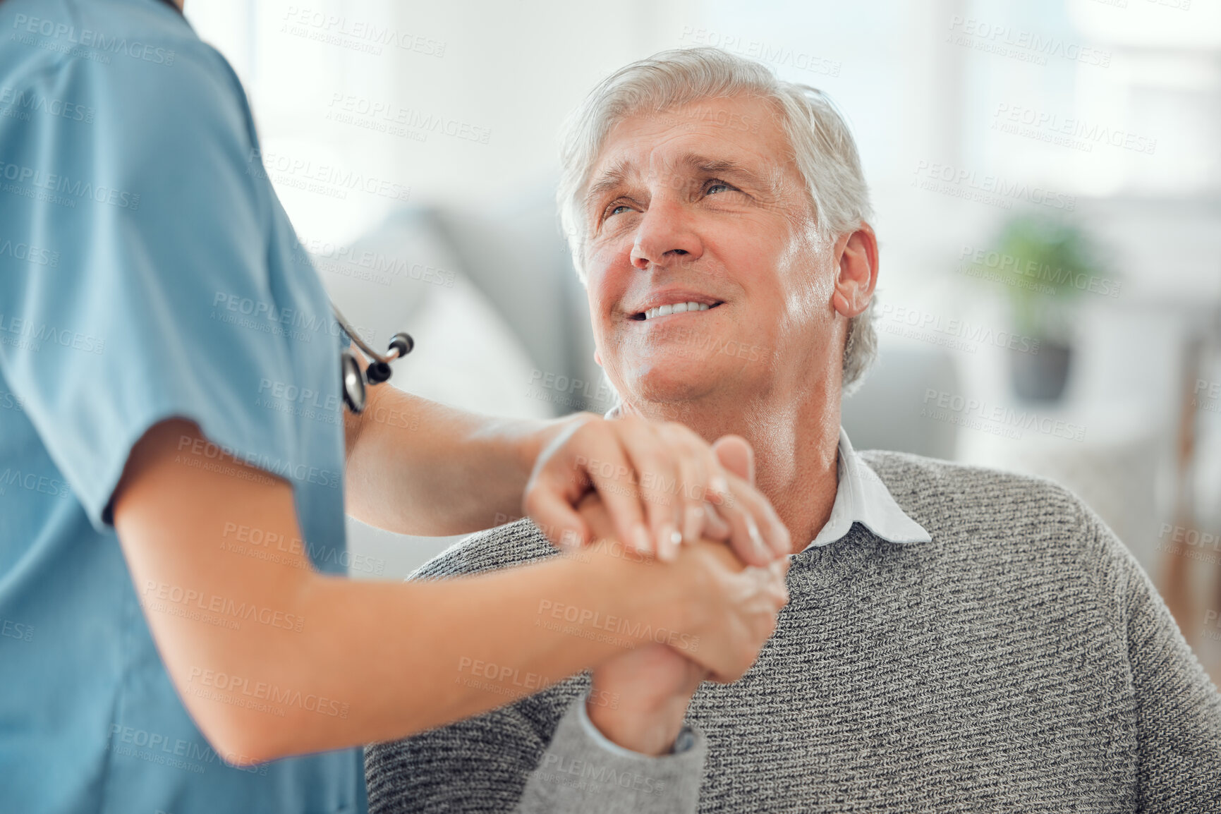 Buy stock photo Senior man, caregiver and support for helping hand, assistance or health in nursing home for retirement. Elderly person, nurse and wellness for service in living room with patient, care or consulting