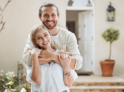 Buy stock photo Shot of an affectionate couple standing outside
