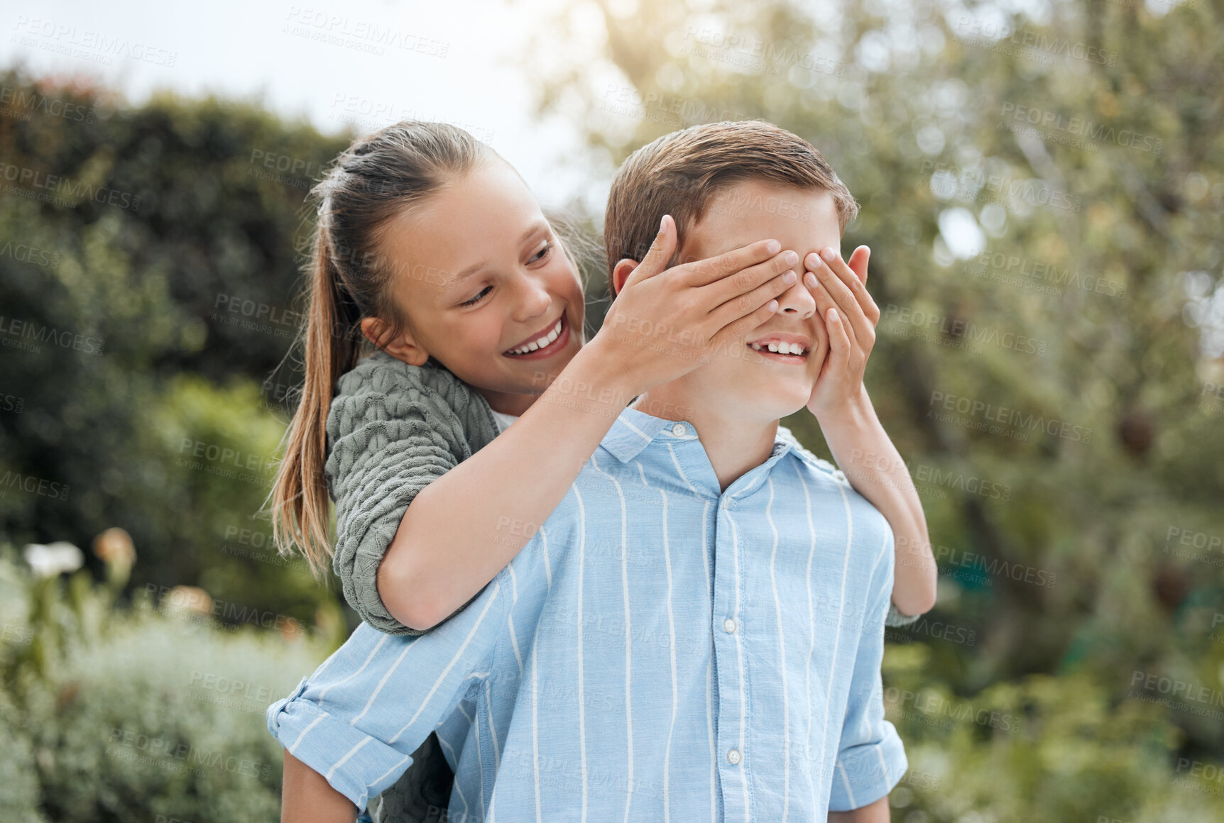 Buy stock photo Children, covered eyes and playful with bonding, excited and siblings for surprise, fun and joy in garden or backyard. Girl, boy and blindfold as family for freedom, creative or positive in Australia