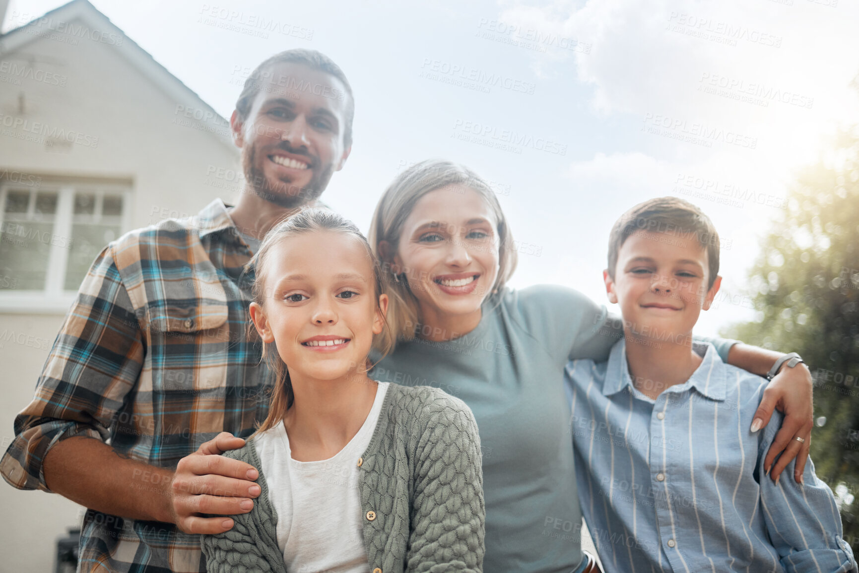 Buy stock photo Happy family, portrait and outdoor hug for love, garden and bonding together in Scotland. Parents, support and embrace children for security in relationship, kids and trust in backyard of home