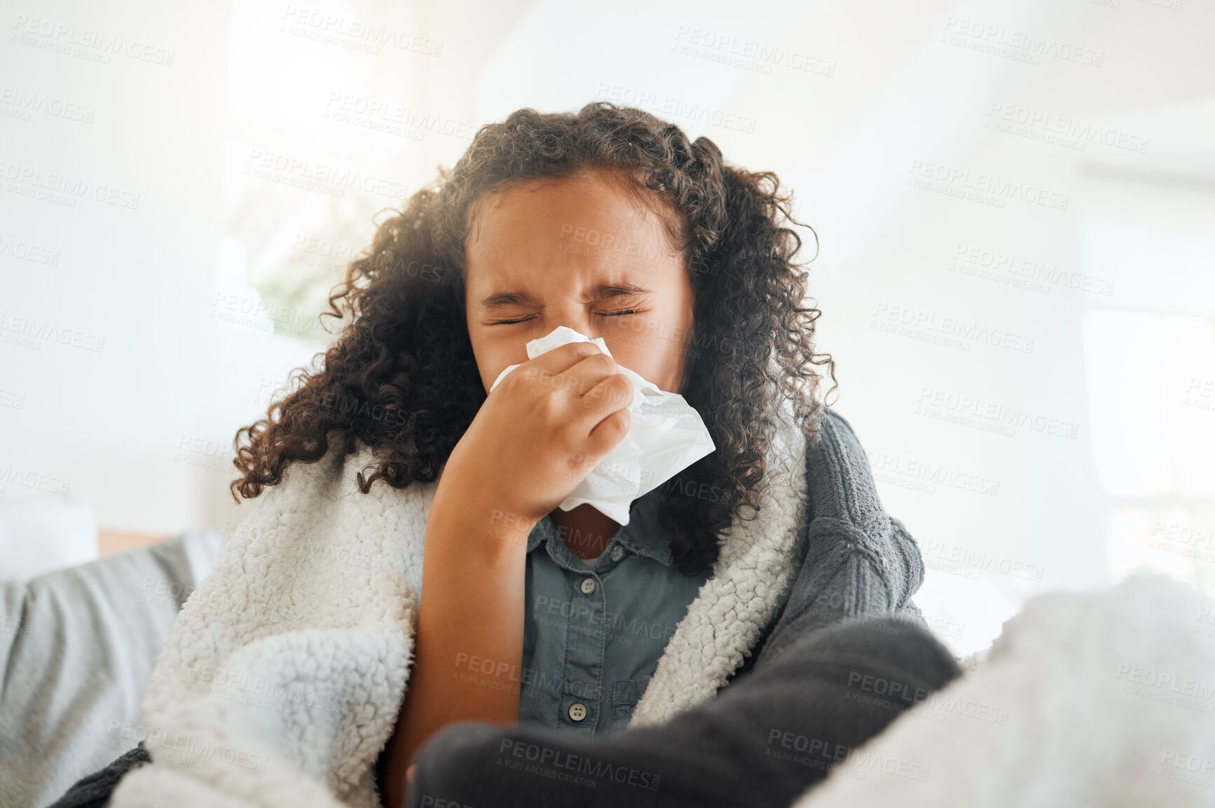 Buy stock photo Little girl, sick and blowing nose with tissue for virus, cold or flu from allergy, symptoms or infection at home. Female person, child or kid with blanket for influenza, sneeze or fever from sinus