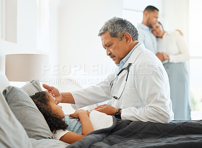 Buy stock photo Home, parents and pediatrician with child for checkup, consulting and evaluate symptoms of young patient. Bedroom, mature man and girl with sickness of fever, flu and doctor for assess temperature