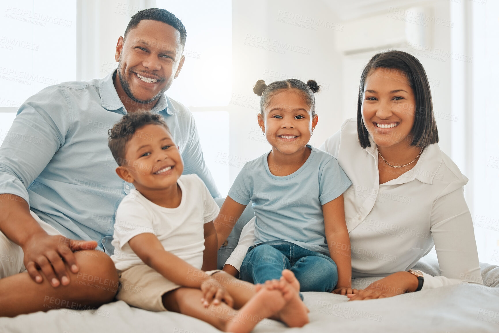 Buy stock photo Love, portrait and care with parents and children in bedroom for relax, bonding and happiness. Smile, support and with people from Brazil in family home for youth, peace and memory together.