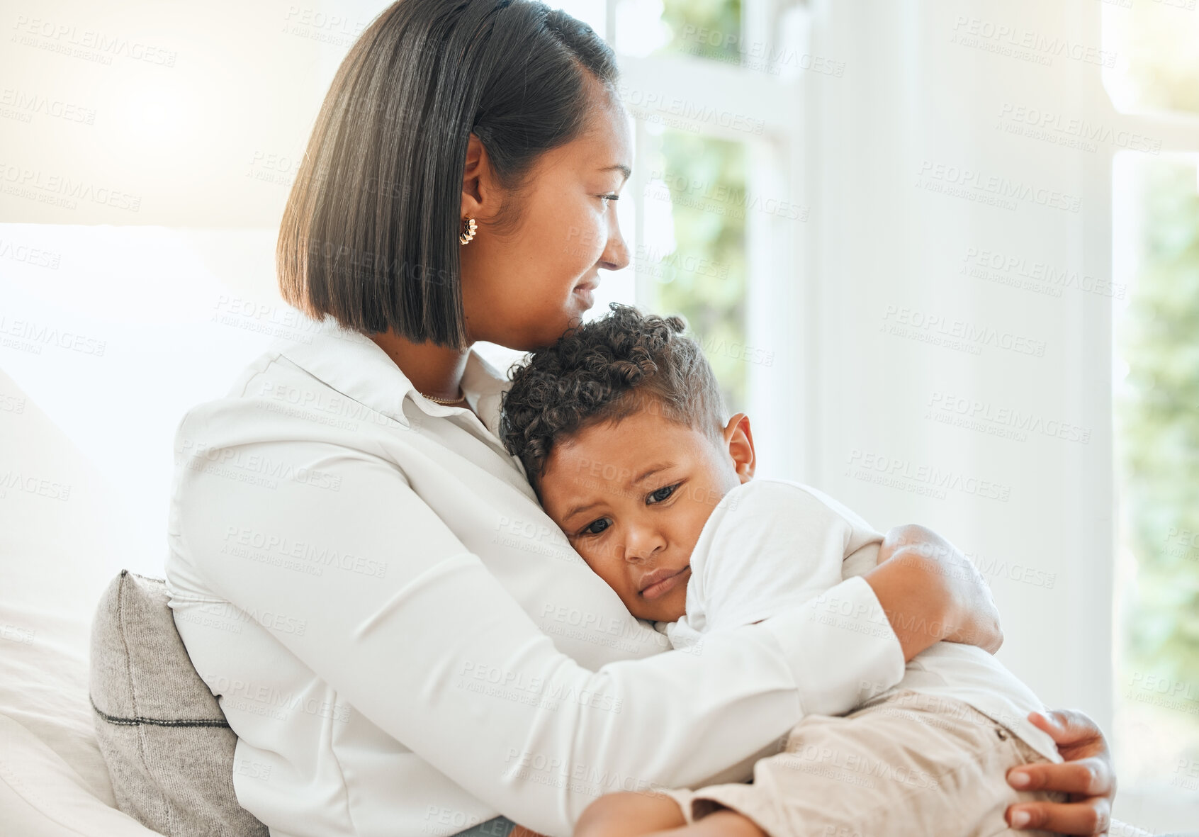 Buy stock photo Sad, hug and comfort with mother and son for bullying, mental health and empathy together. Sympathy, compassion and self esteem with woman and child in family home for embrace, support and care