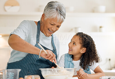 Buy stock photo Grandmother, happy or child baking in kitchen as a happy family with young girl learning cookies recipe. Mixing cake, development or grandma smiling or teaching kid to bake with eggs, butter or flour