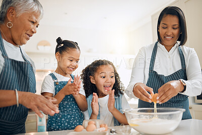 Buy stock photo Grandmother, mom or excited children baking in kitchen as a happy family with young girl learning a recipe. Cracking eggs, clapping or grandma smiling or teaching kids to bake a cake for development