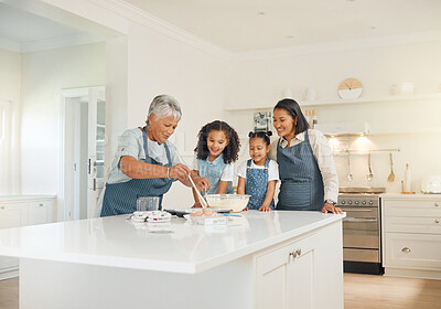Buy stock photo Grandmother, mom or children baking as a happy family with girl siblings learning cookies recipe at home. Mixing cake, development or grandma smiling or teaching kid to help bake with eggs or flour