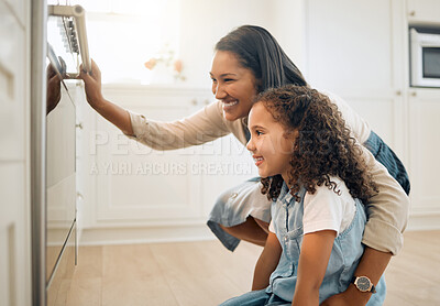 Buy stock photo Mother, oven or child baking in kitchen as a happy family with young girl learning cookies recipe. Cake, wait or mom smiling, helping or teaching daughter to bake with a smile for development at home