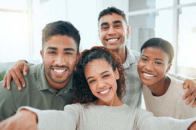 Buy stock photo Shot of a diverse group of people standing together and taking a selfie after group therapy