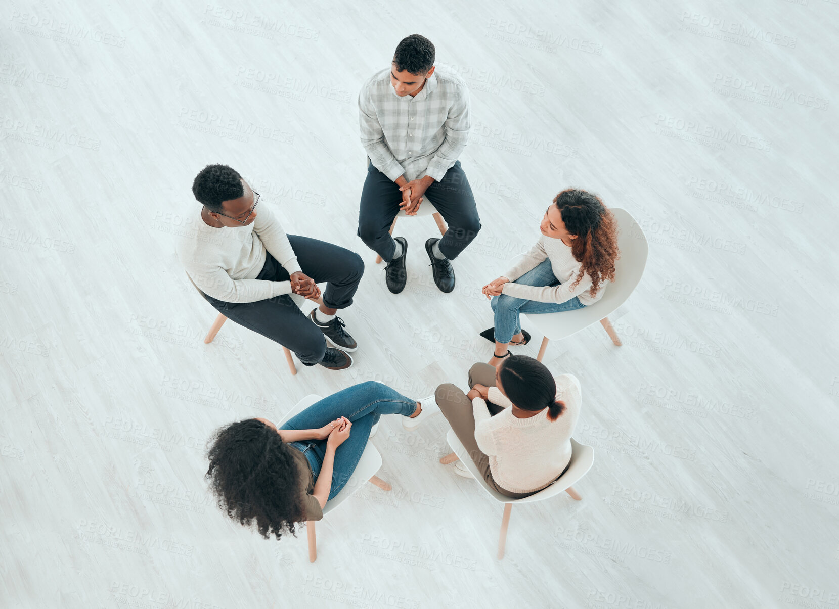 Buy stock photo Above, people and counseling in therapy for discussion, express emotion and share experience in session. Health center, therapist and participants in rehabilitation for depression, trauma or recovery