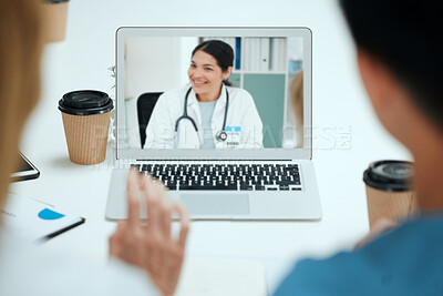 Buy stock photo Shot of a group of doctors on a virtual meeting at a hospital