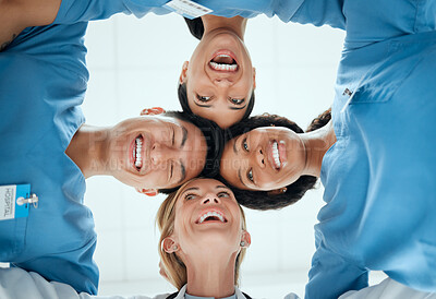 Buy stock photo Smile, teamwork or faces of doctors in huddle laughing in collaboration together for healthcare goals. Low angle, funny team building or happy medical nurses with group support, motivation or mission