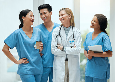 Buy stock photo Diversity, teamwork or doctors talking on a break or laughing in a funny conversation in hospital. Happy people, joke or group of nurses medical employees on coffee breaks on lunch together in clinic