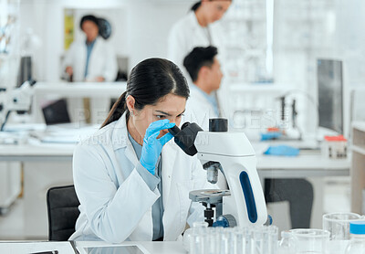 Buy stock photo Woman, microscope and research in lab for healthcare, observation and experiment results. Scientist, tech and study at table for medicine engineering, pharmaceutical development or science innovation