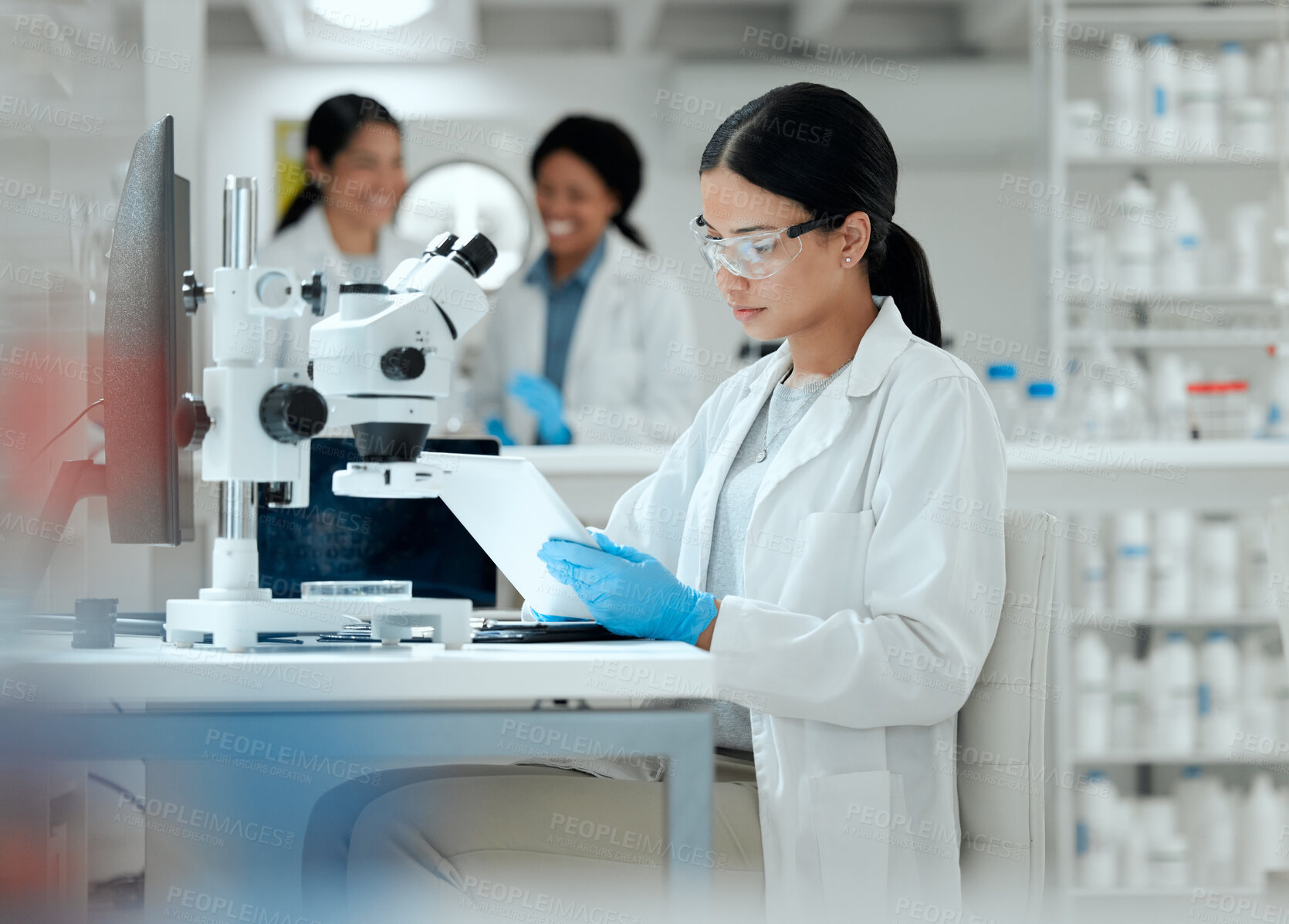 Buy stock photo Scientist, study and woman with tablet by microscope for medical research, pathogen and development. Science, pharmaceutical and biotech with experiment for Mpox vaccine, innovation and epidemiology