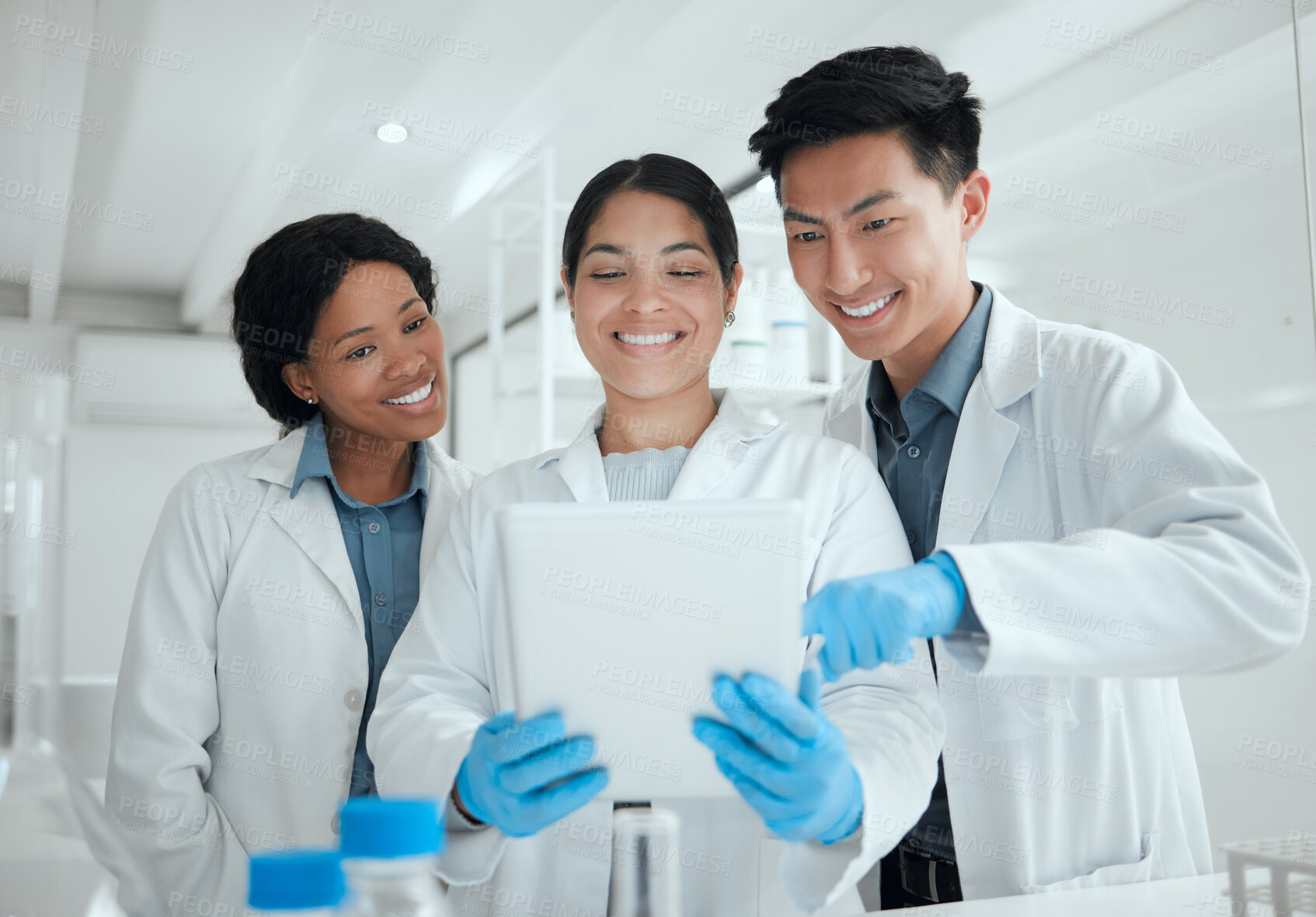 Buy stock photo Good news, review or happy people on tablet for science breakthrough, clinical trial or discovery. Teamwork, smile or group of scientist reading results for vaccine research, mpox cure or development