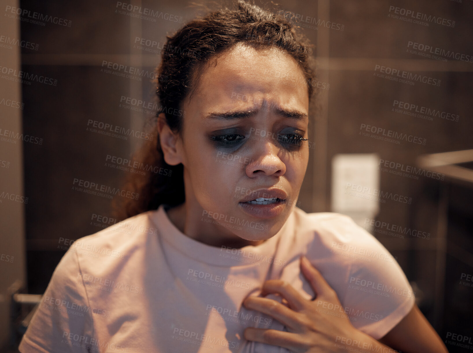 Buy stock photo Shot of a young female experiencing internal turmoil in the bathroom at home