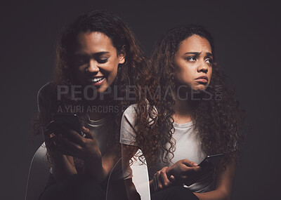 Buy stock photo Mental health, phone and woman in studio on social media with stress, fear or bipolar disorder. Double exposure, cellphone and female person with trauma, anxiety or schizophrenia by black background.