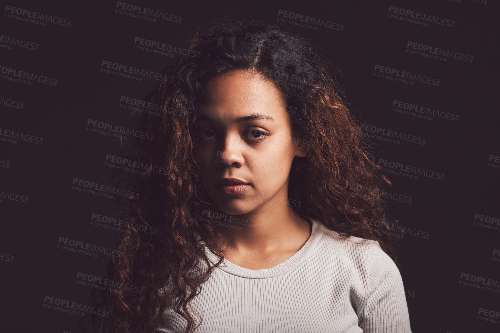 Buy stock photo Sad, portrait and person with bipolar disorder in studio for mental health, psychology and ptsd illness. Identity crisis, mindset and depression with woman on black background for mood swing mockup