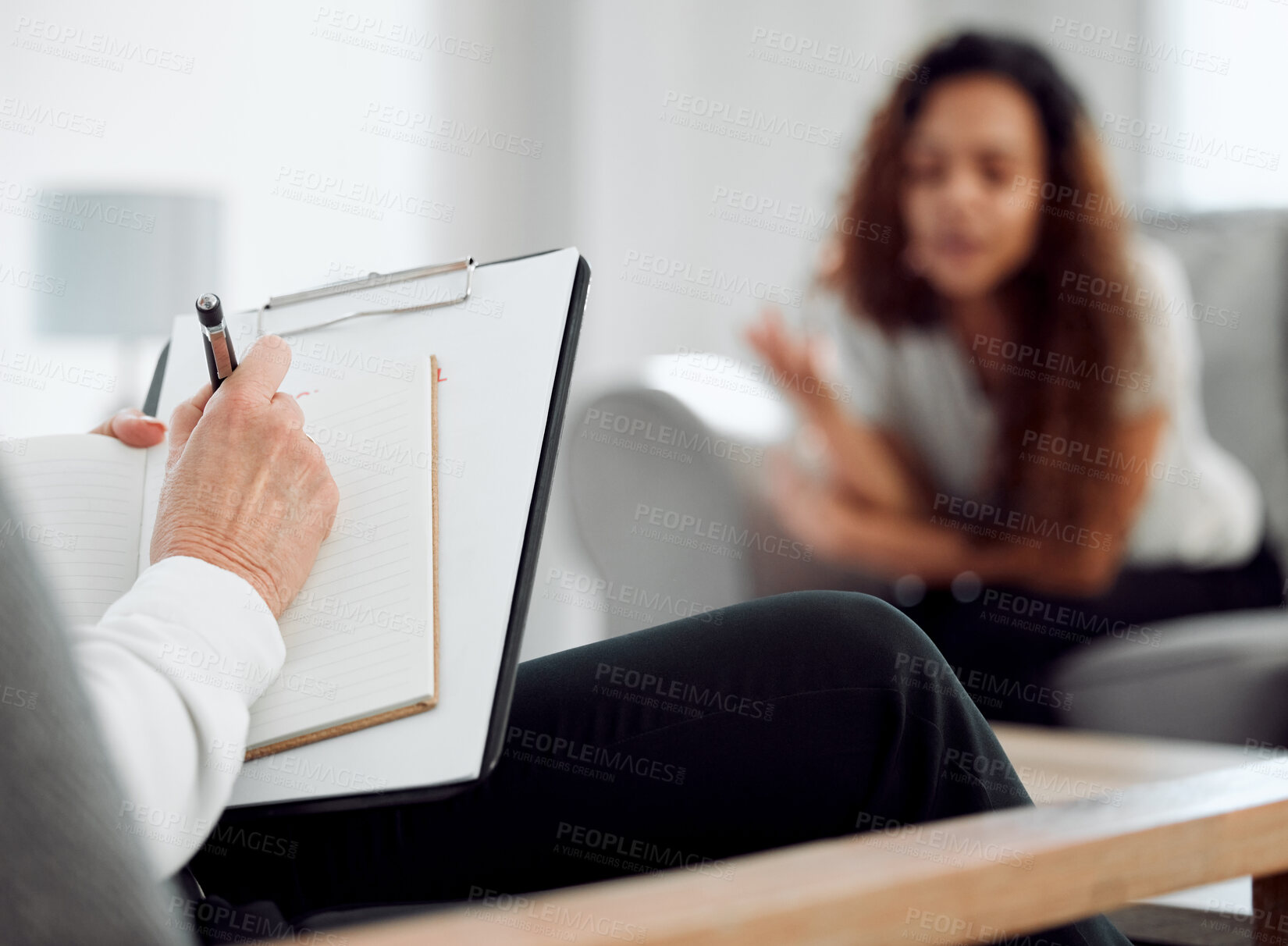 Buy stock photo Hand, psychologist and writing in notebook with patient in consultation for help, support or mental health. Notes, counseling or therapist closeup for stress, addiction advice or depression in office