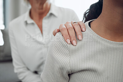 Buy stock photo Cropped shot of an unrecognisable psychologist sitting and comforting her patient during a consultation