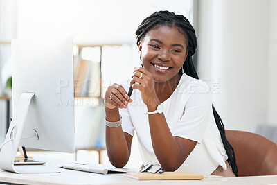 Buy stock photo Young black woman at desk with computer, smile and pen, online research for small business administration. Happy face of African businesswoman in office planning schedule, proposal or startup report.