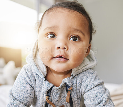 Buy stock photo Happy, comfy and portrait of baby on bed to relax, sleep and rest with pajamas. Infant, cute and adorable boy crawl in bedroom for childhood, growth and happiness in house or apartment with smile