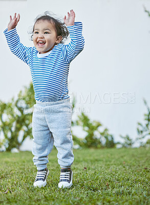 Buy stock photo Backyard, happy and toddler child with jumping for playing, cheerful and imagination with girl for creativity. Outdoor, little kid and excited by space for games, energy and carefree in nature