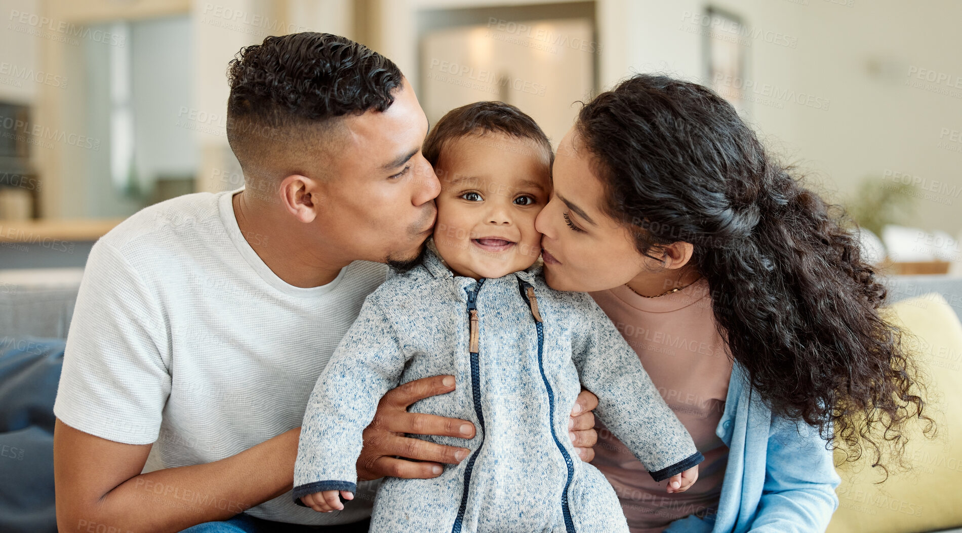 Buy stock photo Family, kiss and portrait of baby in home living room, bonding and having fun in house. Father, mother and kissing face of newborn on sofa for love, care and affection, happiness and smile together.