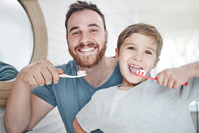 Buy stock photo Portrait, father with his child brush their teeth and in bathroom together of their home. Healthcare or dental care, happiness or smile and parent with child brushing their mouth with toothbrush