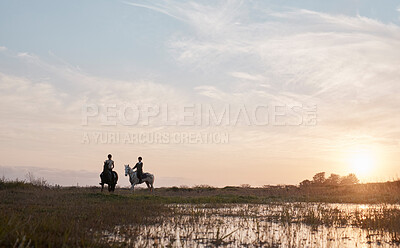 Buy stock photo Horse riding, friends and people in countryside at sunset outdoor on vacation, holiday or travel. Equestrian, animals and women on horseback in field on adventure, journey and race together in nature