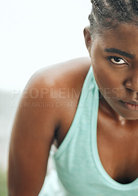 Buy stock photo Shot of a young woman resting while running
