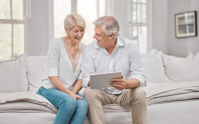 Buy stock photo Senior couple, happy and tablet on sofa for planning retirement, love relationship and social network in home. Smile, mature woman and man with tech for pension website, online movie and bonding