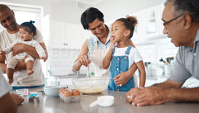 Buy stock photo Shot of a family baking together