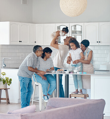 Buy stock photo Shot of a family baking together