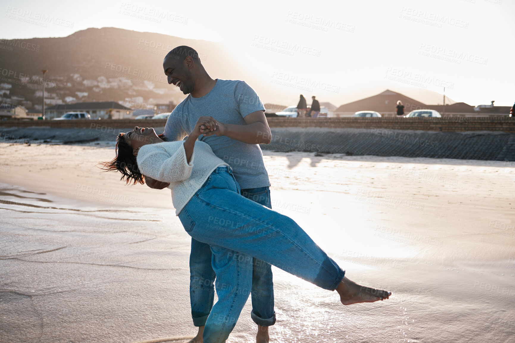 Buy stock photo Love, dancing and couple on beach with smile for holiday, adventure or bonding together. Travel, relationship and happy man with woman by ocean for romance, summer vacation or fun date in Mexico