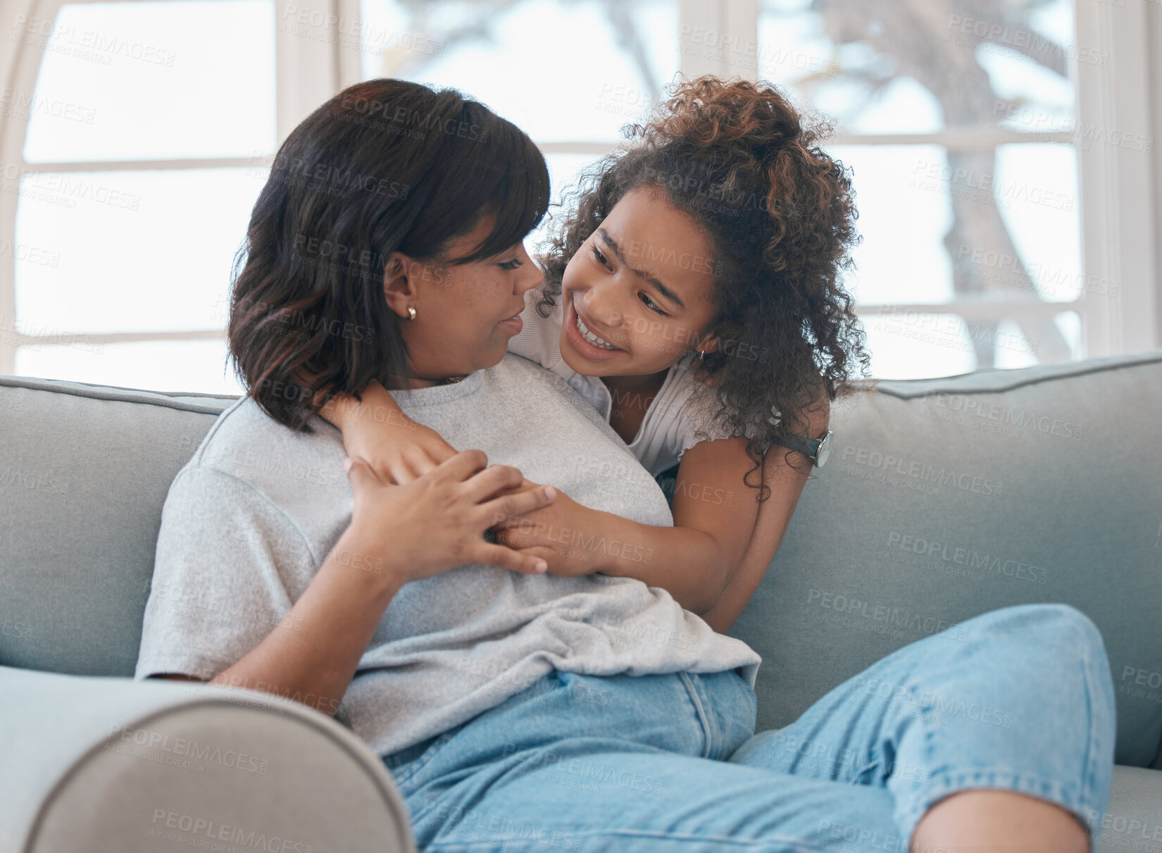 Buy stock photo Happy, mom and girl relax on sofa with love or family time, bonding and embrace in modern house on weekend. Mother, child and home on couch with hug for affection or care, together and cheerful.