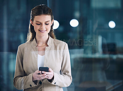 Buy stock photo Phone, night or happy businesswoman on social media texting or typing an email in online conversation. Office, mobile app or girl employee on web chat for blog post or networking on late break at job
