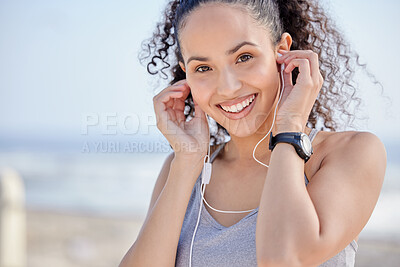 Buy stock photo Portrait, exercise and woman with earphones, outdoor and listen to music, streaming and smile for fitness. Happy, runner and athlete with watch radio or podcast for workout and ready for training