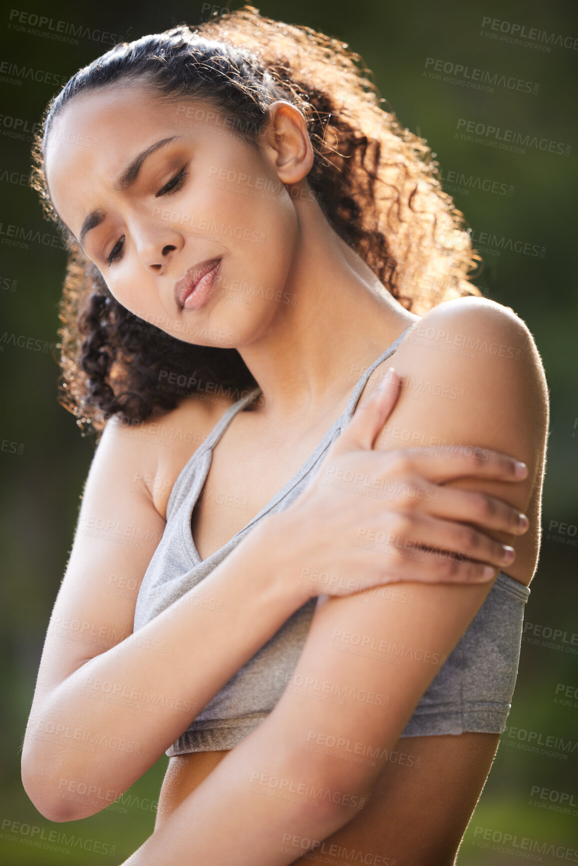 Buy stock photo Woman, fitness and pain in arm with outdoor training, workout and health risk or strain in muscle. Young runner or sports person with body ache, wellness and cardio or endurance exercise in park