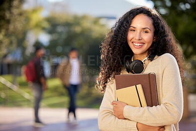 Buy stock photo Portrait of an attractive young female student standing outside on campus