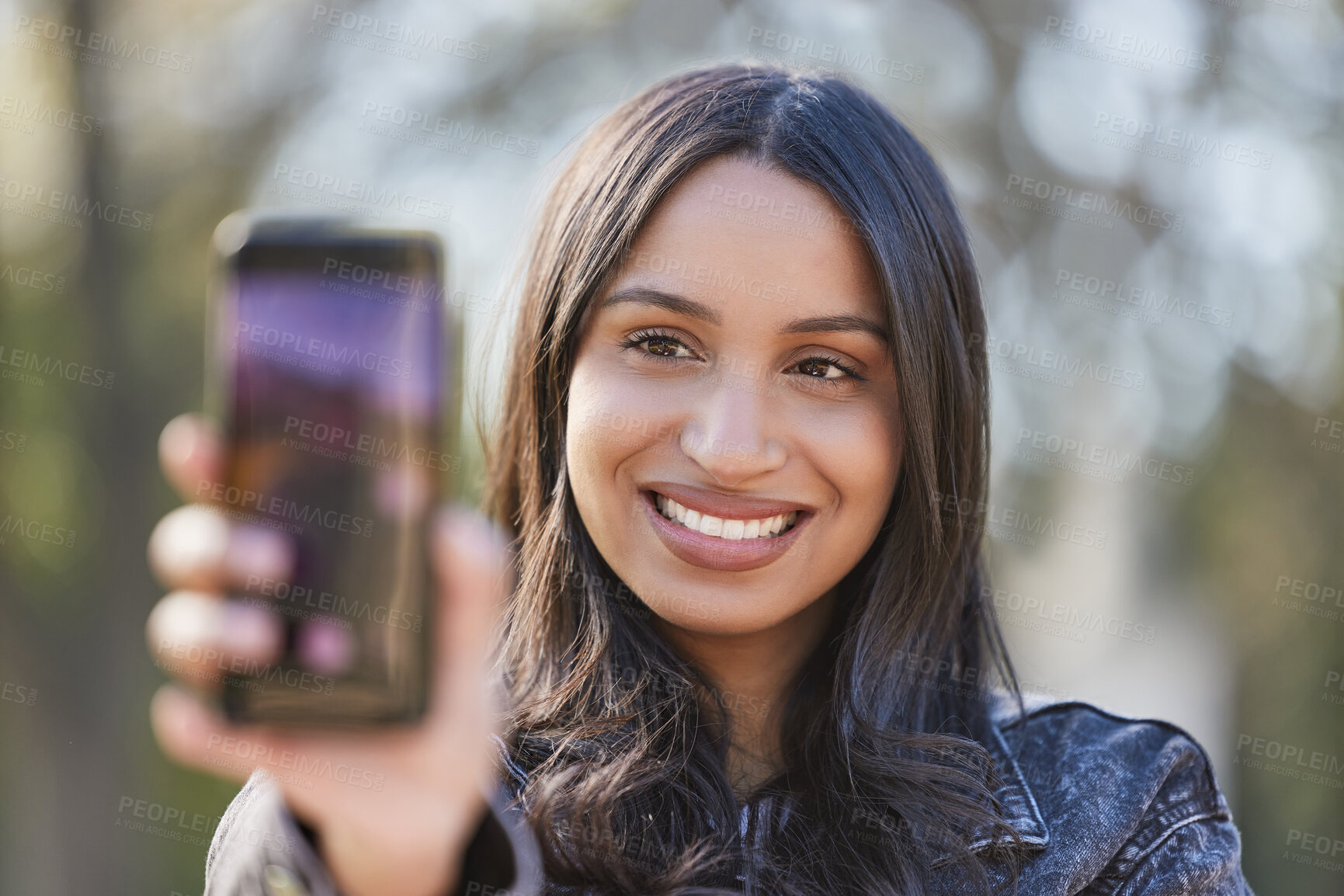 Buy stock photo Young woman, selfie and smile outdoor in park for social media, internet sharing and memories. Happy, female person or student in nature with photography for communication, contact and online post