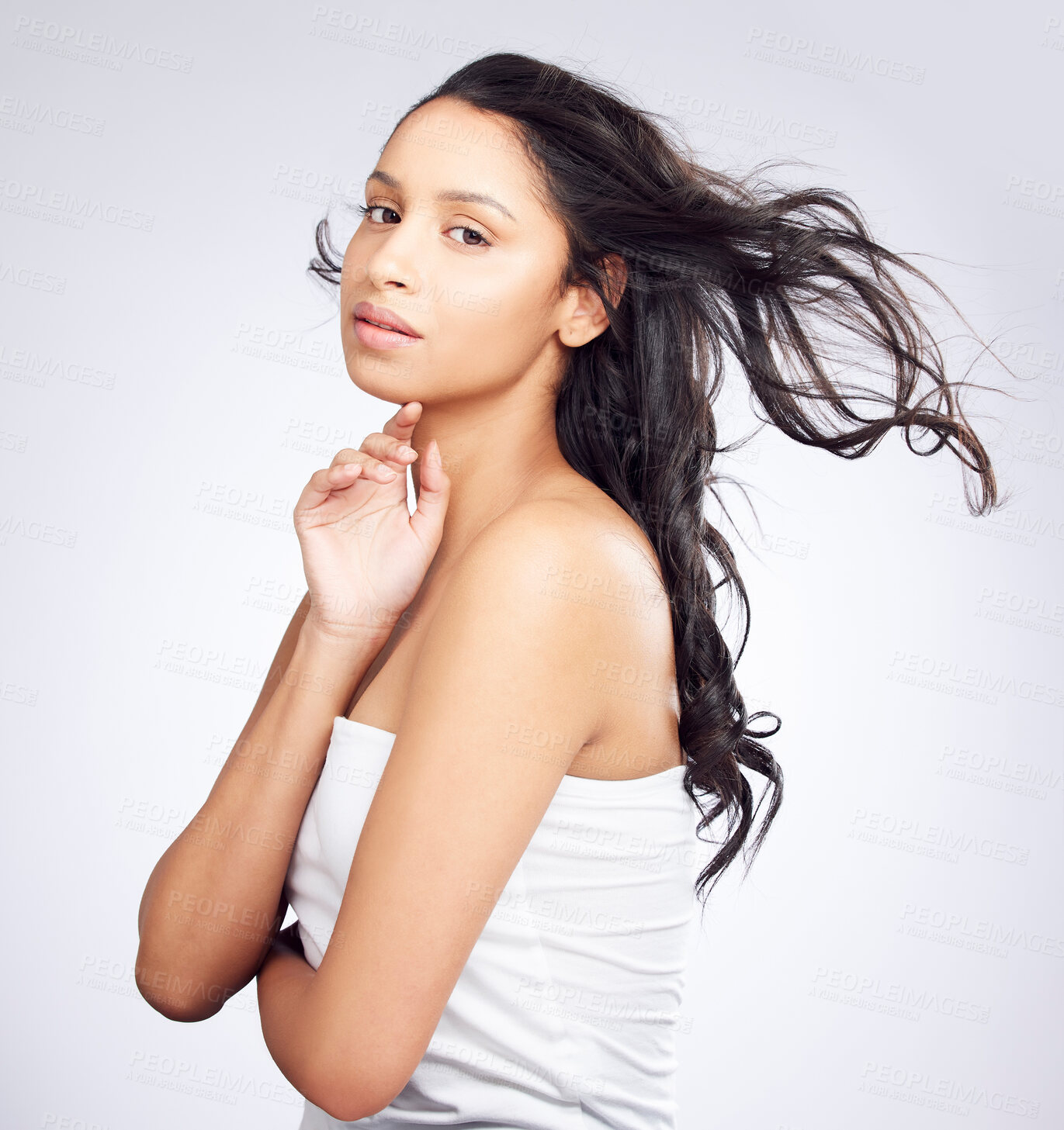 Buy stock photo Portrait, hair care and woman with beauty, breeze and cosmetics on white studio background. Face, person and model with volume, texture and shine with grooming routine, keratin treatment and wind