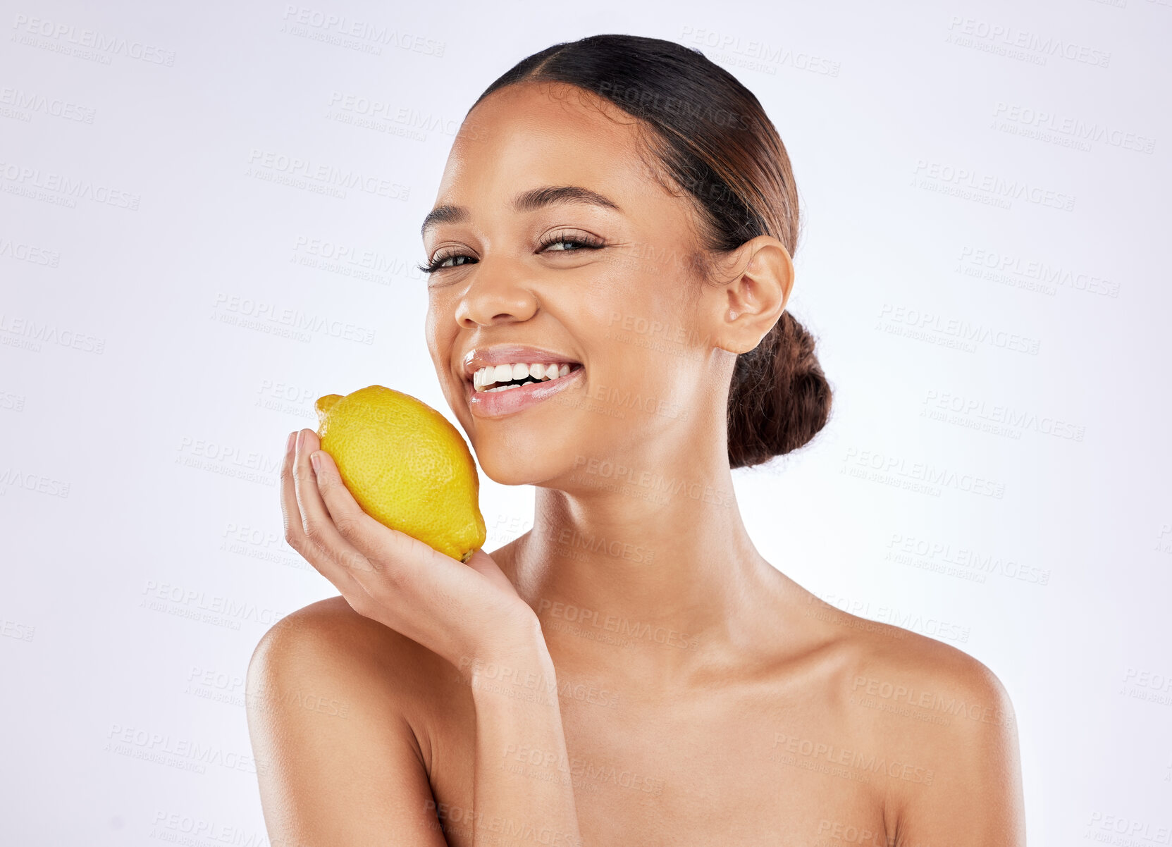 Buy stock photo Woman, smile and lemon for skincare in studio on white background and satisfied with routine. Natural, beauty and happy on confidence with fruit for skin treatment, ingredient and glow on portrait