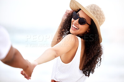 Buy stock photo Holding hands, smile and woman by beach for travel, vacation or weekend trip in Maldives. Happy, love and female person with sunglasses on holiday by ocean with boyfriend for romantic date together.