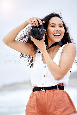 Buy stock photo Beach, portrait and woman with camera for photography, nature scenery and vacation adventure with memory. Girl, ocean and photographer with DSLR lens for sea travel and cinematic picture in Australia