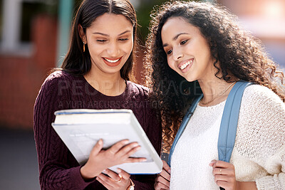 Buy stock photo Reading, university and women with book on campus for learning, knowledge and studying. Education, friendship and happy female students with textbook for information, research and college lesson