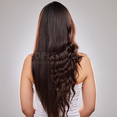 Buy stock photo Hair care, beauty and back of woman in a studio with a long, straight and curly hairstyle. Cosmetic, self care and female model with a keratin, health or salon treatment isolated by a gray background