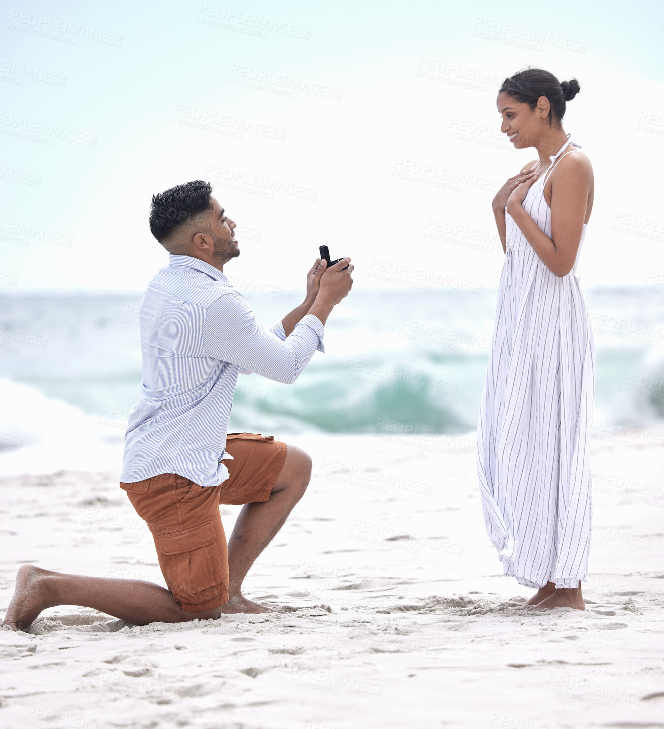 Buy stock photo Couple, proposal and engagement ring at beach on vacation, holiday and destination for marriage as boyfriend and girlfriend. Happy woman, man and relationship in Bali for question, surprise and date