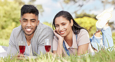 Buy stock photo Man, woman and portrait in nature for date, picnic and champagne for love in field. Couple, happiness and romance in park for celebration, anniversary and vacation or travel to countryside together